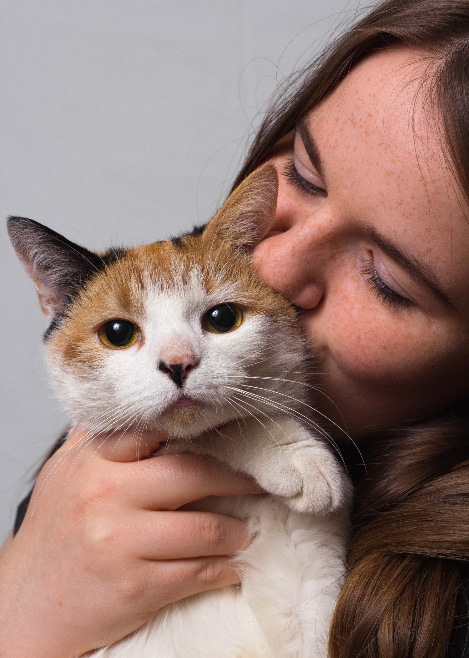 A girl with her cat by 62719509@N04 / nielskliim holding cat photo